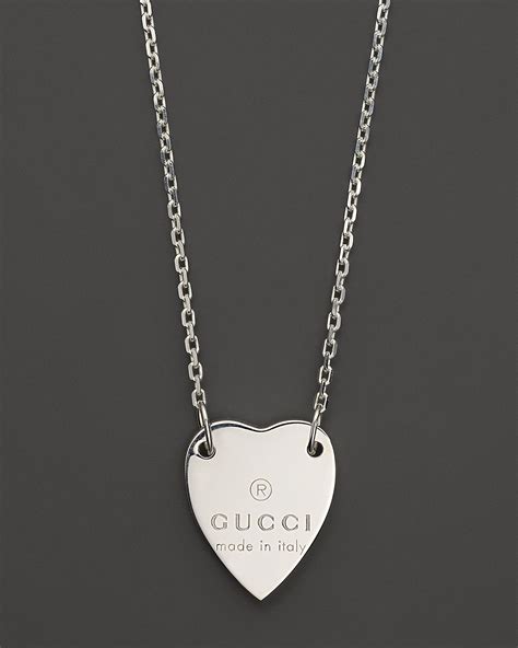 heart necklace with gucci trademark gold|gucci necklace with heart pendant.